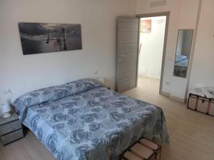 Postel nebo postele na pokoji v ubytování La Fenice