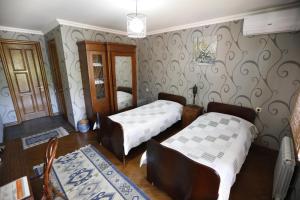 Postel nebo postele na pokoji v ubytování Casa de Khasia