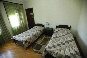 Postel nebo postele na pokoji v ubytování Casa de Khasia