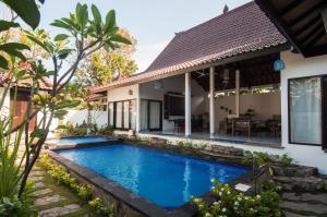 una imagen de una villa con piscina en Ambary House Gili Trawangan- 2 BR Private Villa, Pool, en Gili Trawangan