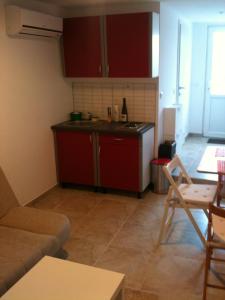 Η κουζίνα ή μικρή κουζίνα στο Apartments Ana-Marin