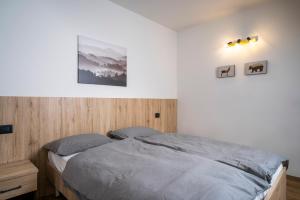 Posteľ alebo postele v izbe v ubytovaní Cauriol Suites 1.1
