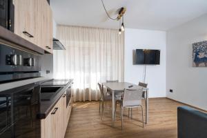 Kuchyňa alebo kuchynka v ubytovaní Cauriol Suites 1.1