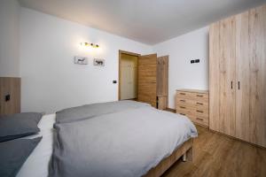 Posteľ alebo postele v izbe v ubytovaní Cauriol Suites 1.1
