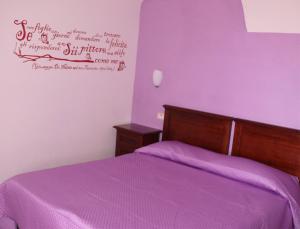 Postel nebo postele na pokoji v ubytování Art Hotel