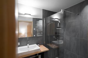 Kúpeľňa v ubytovaní Oberzerod Apartments + 18 fotografií