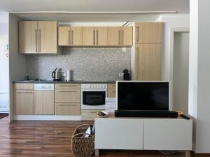 Kuchyň nebo kuchyňský kout v ubytování Schöne Wohnung in ruhiger Lage mit Garten.