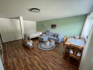 Posezení v ubytování Schöne Wohnung in ruhiger Lage mit Garten.