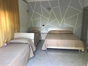 Postel nebo postele na pokoji v ubytování B&B The King