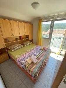 Postel nebo postele na pokoji v ubytování Apartment Marsela