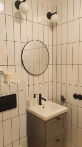Kúpeľňa v ubytovaní Kurkowa Apartment + 37 fotografií
