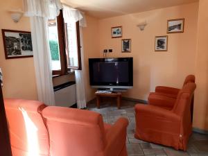 TV a/nebo společenská místnost v ubytování Hotel Brufa