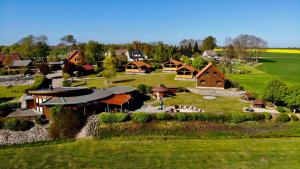 an aerial view of a farm with houses and a field at Naturcamp Duvendiek FeWo in Duvendiek