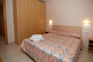 Cama o camas de una habitación en Apartamentos Siglo XXI - Sant Joan