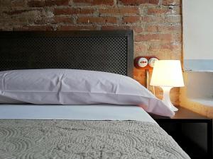 Postel nebo postele na pokoji v ubytování Mazi Apartments Penthouse
