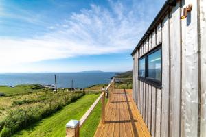 a house with a view of the ocean at Byre 7 Aird of Sleat in Aird of Sleat