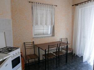 Kuchyň nebo kuchyňský kout v ubytování Apartments & Rooms Tony