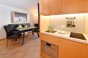 Kuchyň nebo kuchyňský kout v ubytování Apartment Marent Garten Chalet