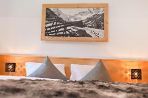 Postel nebo postele na pokoji v ubytování Apartment Marent Garten Chalet