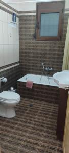 Koupelna v ubytování Maison du Bonheur