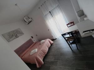Postel nebo postele na pokoji v ubytování B&B Aurora