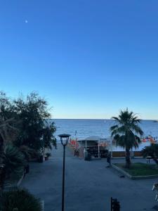 a view of the ocean from the balcony of a resort at Maniman in Varazze