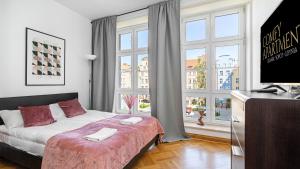 Posteľ alebo postele v izbe v ubytovaní Old Town Center - Przy Deptaku