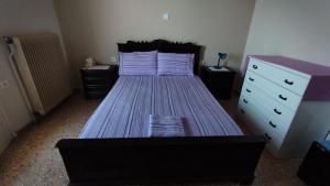 A bed or beds in a room at Anastasia's House near Kalamata