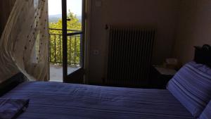A bed or beds in a room at Anastasia's House near Kalamata