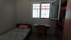 A bed or beds in a room at Anastasia's House near Kalamata