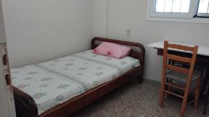 A bed or beds in a room at Anastasia's House near Kalamata
