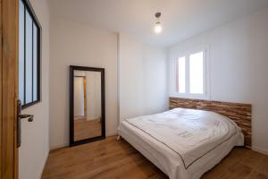 Posteľ alebo postele v izbe v ubytovaní Tredici- Appartment