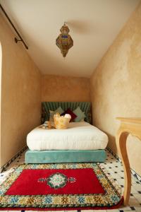 En eller flere senger på et rom på Riad dar Celine