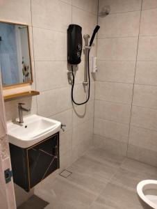 Ένα μπάνιο στο Homestay Melaka at Mahkota Hotel - unit 3093, 2092 - FREE Wifi & Parking