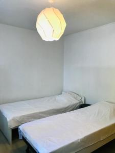 Posteľ alebo postele v izbe v ubytovaní Bas de villa avec piscine, 5km de la plage