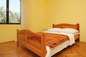 Postel nebo postele na pokoji v ubytování Apartments by the sea Starigrad, Paklenica - 6623