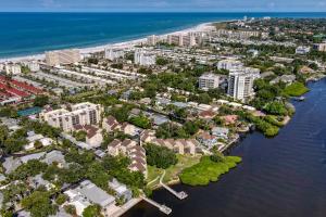 an aerial view of a city next to the ocean at Bay Oaks 75 in Siesta Key