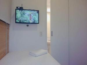 Televisyen dan/atau pusat hiburan di YVM Hotel Kafir