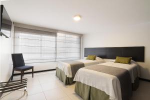 Katil atau katil-katil dalam bilik di YVM Hotel Kafir