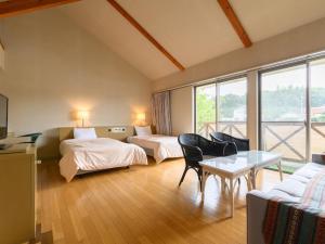 Postelja oz. postelje v sobi nastanitve Tabist Villa Daio Resort Ise-Shima