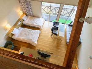Postelja oz. postelje v sobi nastanitve Tabist Villa Daio Resort Ise-Shima