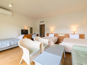 Postelja oz. postelje v sobi nastanitve Tabist Villa Daio Resort Ise-Shima