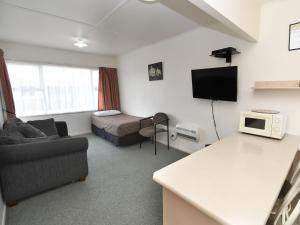 TV a/nebo společenská místnost v ubytování Avon Motel + 25 fotografií