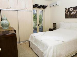 Posteľ alebo postele v izbe v ubytovaní Holiday house for 10 persons, with swimming pool + 12 fotografií
