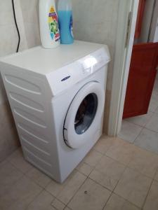 a washer and dryer in a room with at Kokagia House in Cherronisos