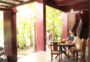 Huéspedes de Teak house