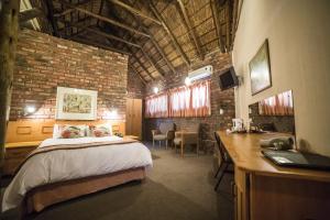 Postel nebo postele na pokoji v ubytování Acacia Guesthouse Klerksdorp