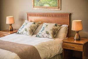 Postel nebo postele na pokoji v ubytování Acacia Guesthouse Klerksdorp