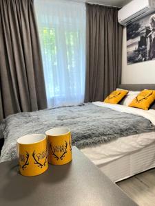 En eller flere senge i et værelse på MYFREEDOM Апартаменти Солом'янський район