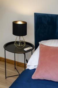 Łóżko lub łóżka w pokoju w obiekcie Royal Gdansk